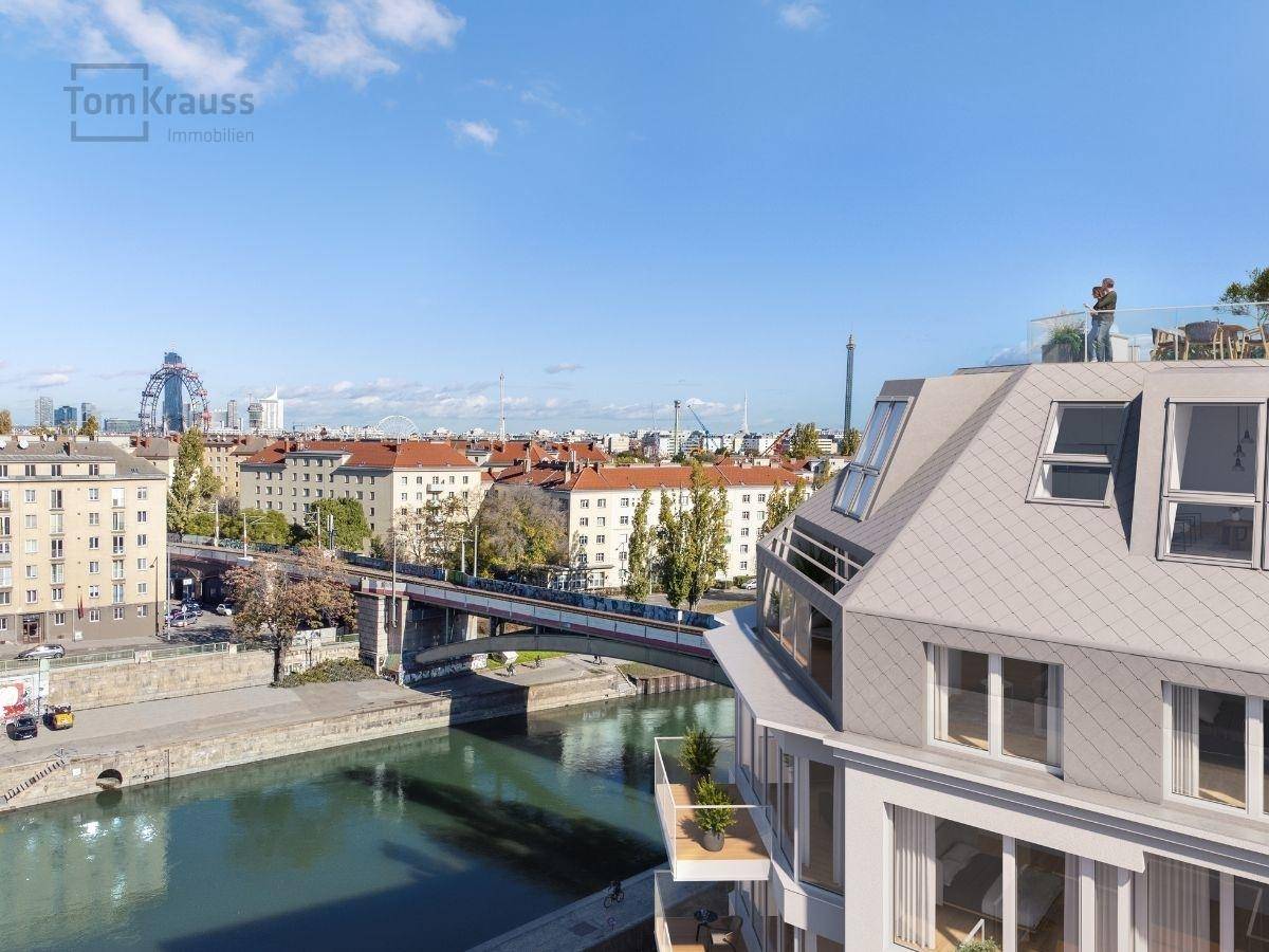 Dachterrasse mit Panoramablick über die Stadt und den Fluss, ideal für Entspannung.