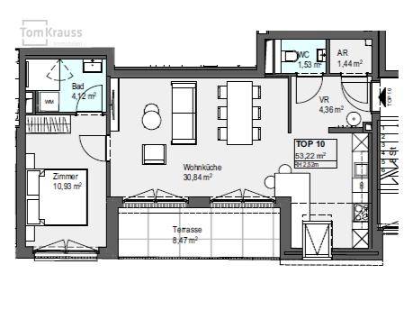 Grundriss einer Wohnung mit Wohnküche, Schlafzimmer, Bad, WC und Terrasse.