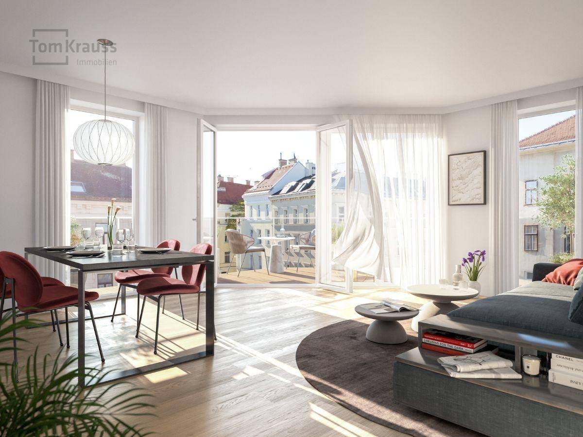 Heller Wohn-Essbereich mit Zugang zu einem Balkon, modernen Möbeln und Holzboden.