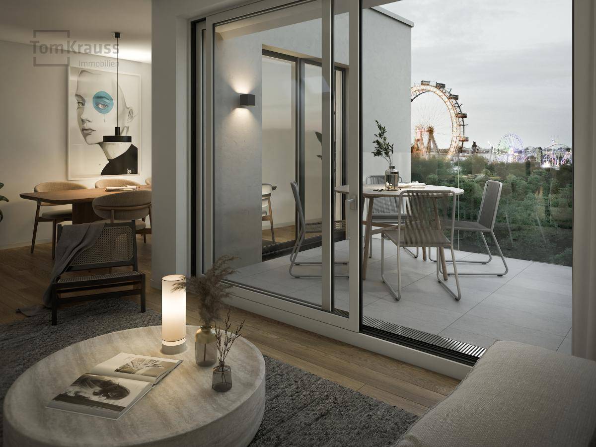Helles Wohnzimmer mit Zugang zum Balkon und Blick auf das Riesenrad im Prater.