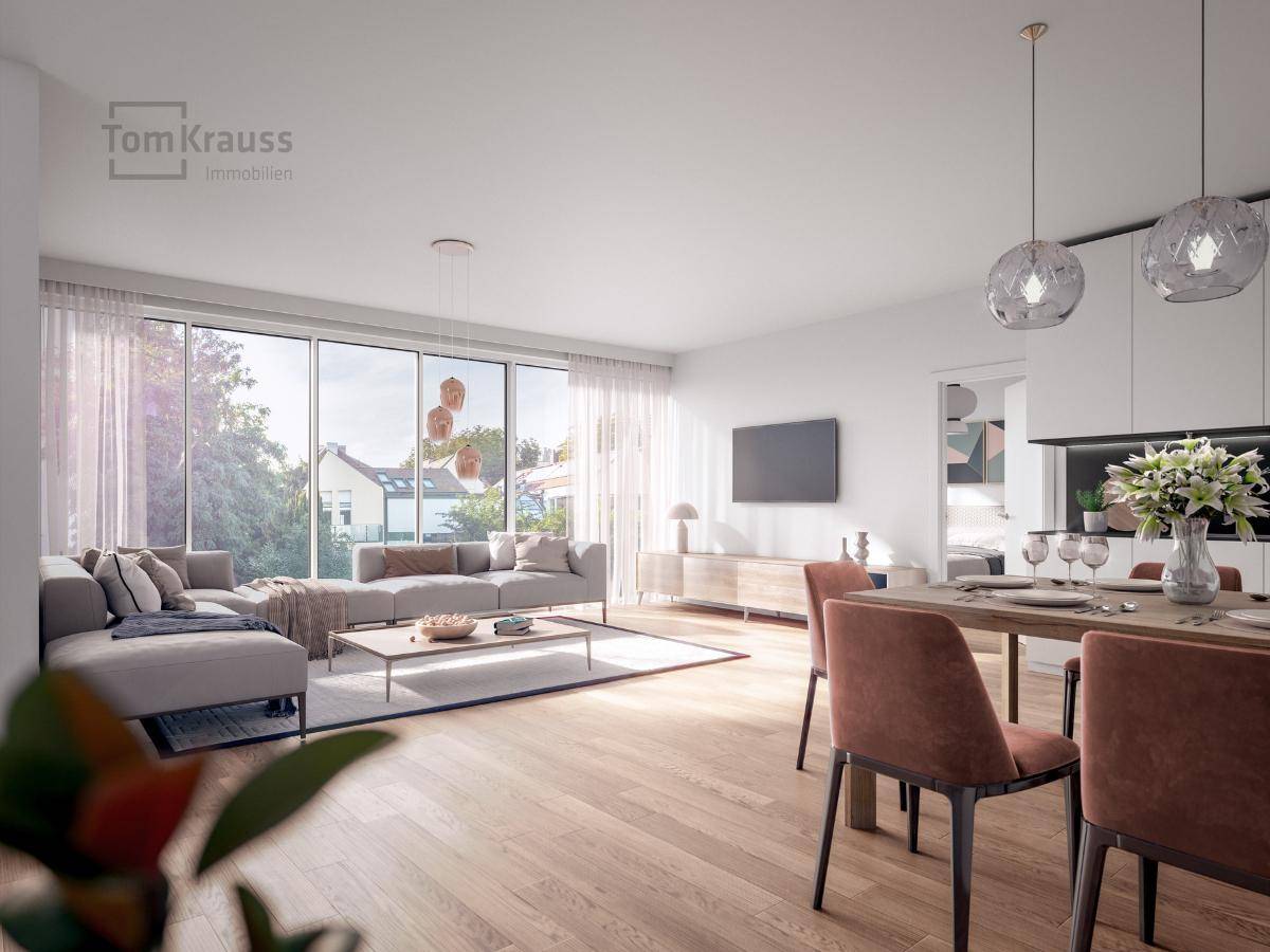 Heller, offener Wohn- und Essbereich mit großen Fenstern, modernem Design und Holzboden.