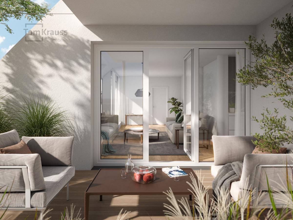 Gemütliche Terrasse mit Lounge-Möbeln und direktem Zugang zum Wohnbereich.