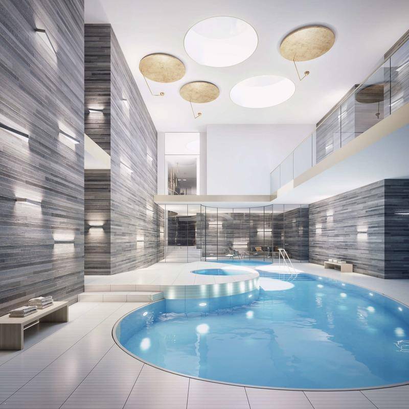 Exklusiver Innenpoolbereich mit modernem Design, Holzverkleidung und runden Deckenleuchten.
