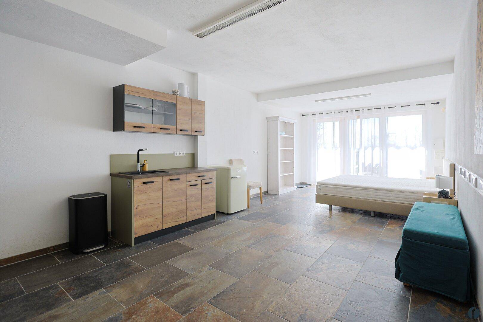 Untergeschoss 1. Zimmer samt Küche