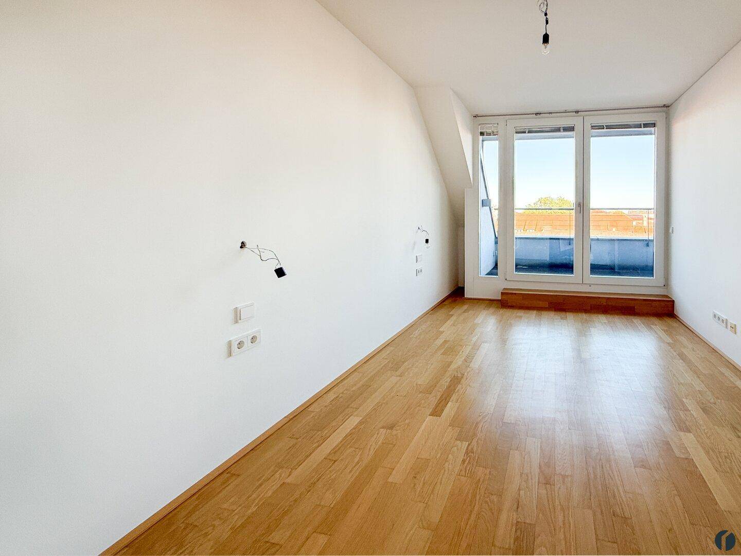 Schlafzimmer mit Ausgang auf den Balkon
