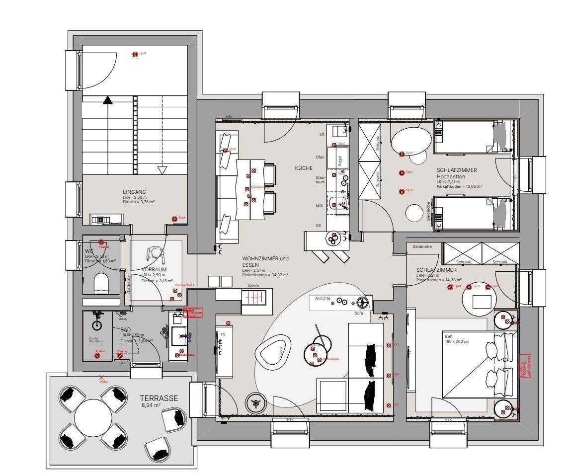 Grundriss einer Erdgeschosswohnung mit drei Schlafzimmern, offenem Wohnbereich und einer großzügigen Terrasse.
