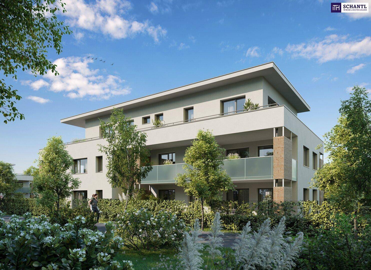 Zeitgenössisches Mehrfamilienhaus mit Balkonen und gepflegter Grünanlage unter blauem Himmel.