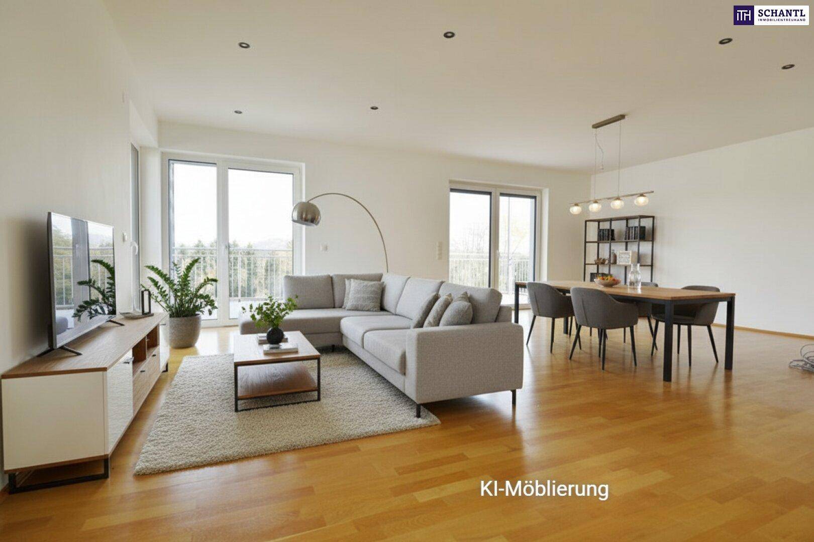 Heller Wohn-Essbereich mit Parkettboden, moderner Einrichtung und Zugang zum Balkon mit Weitblick.