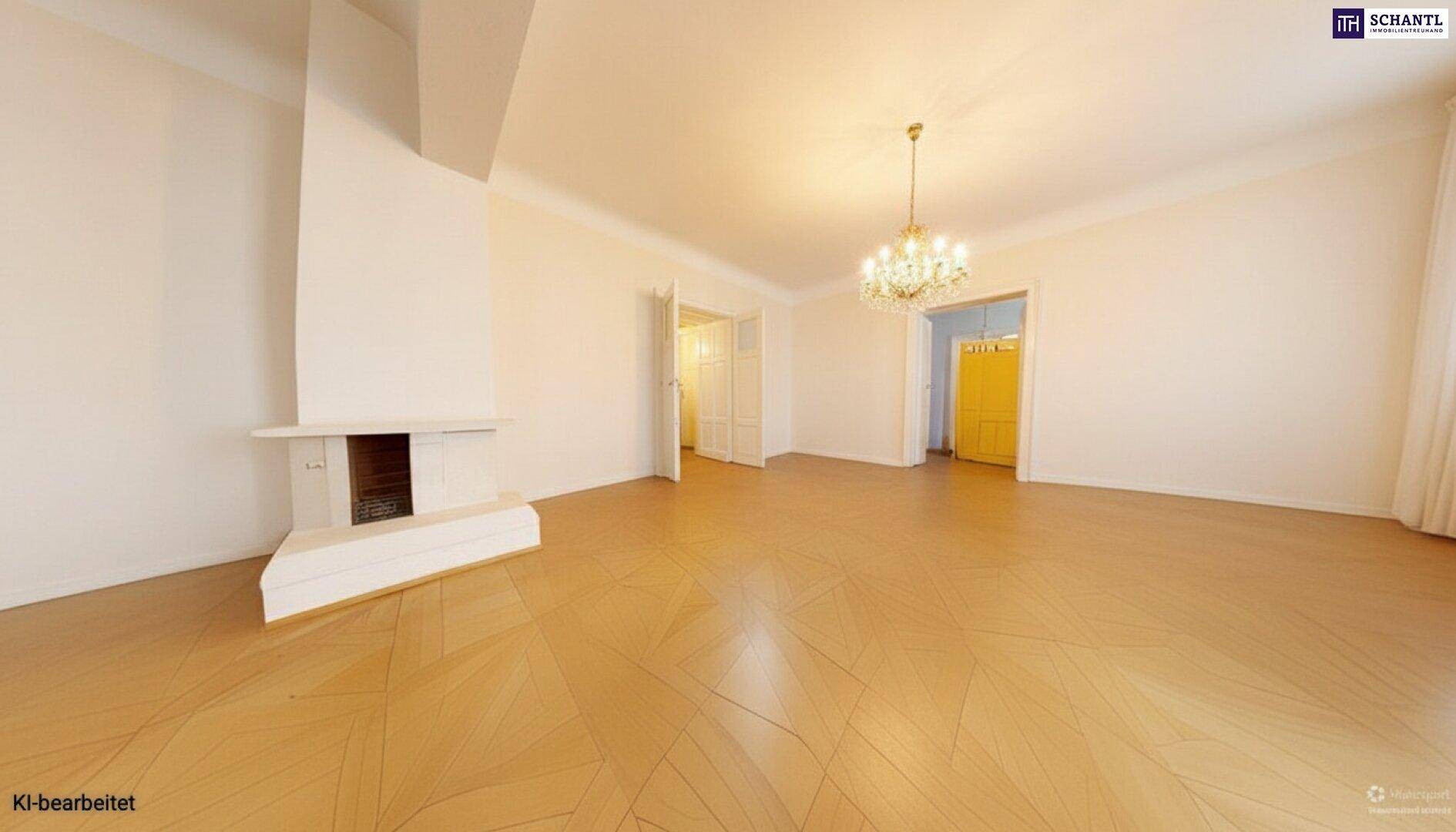 Geräumiges Wohnzimmer mit Parkettboden, Kamin und Zugang zu weiteren Räumen.