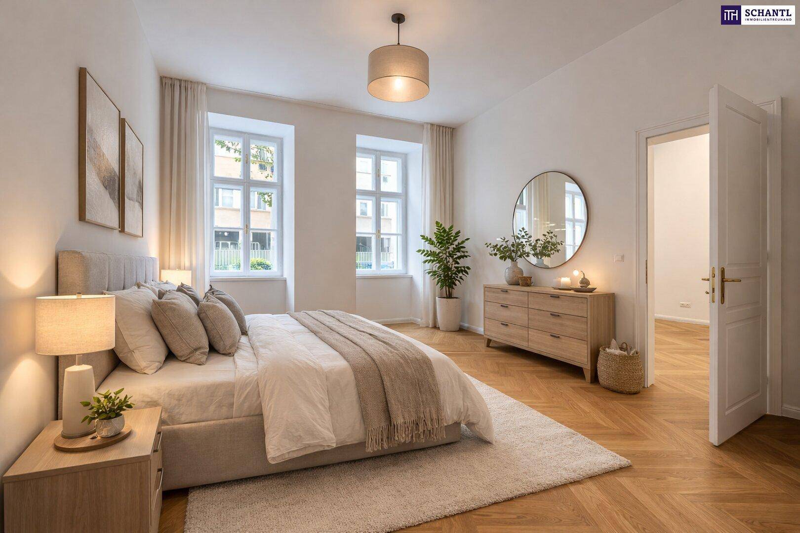 Gemütliches Schlafzimmer mit Doppelbett, modernem Dekor und hellem Fischgrätparkettboden.