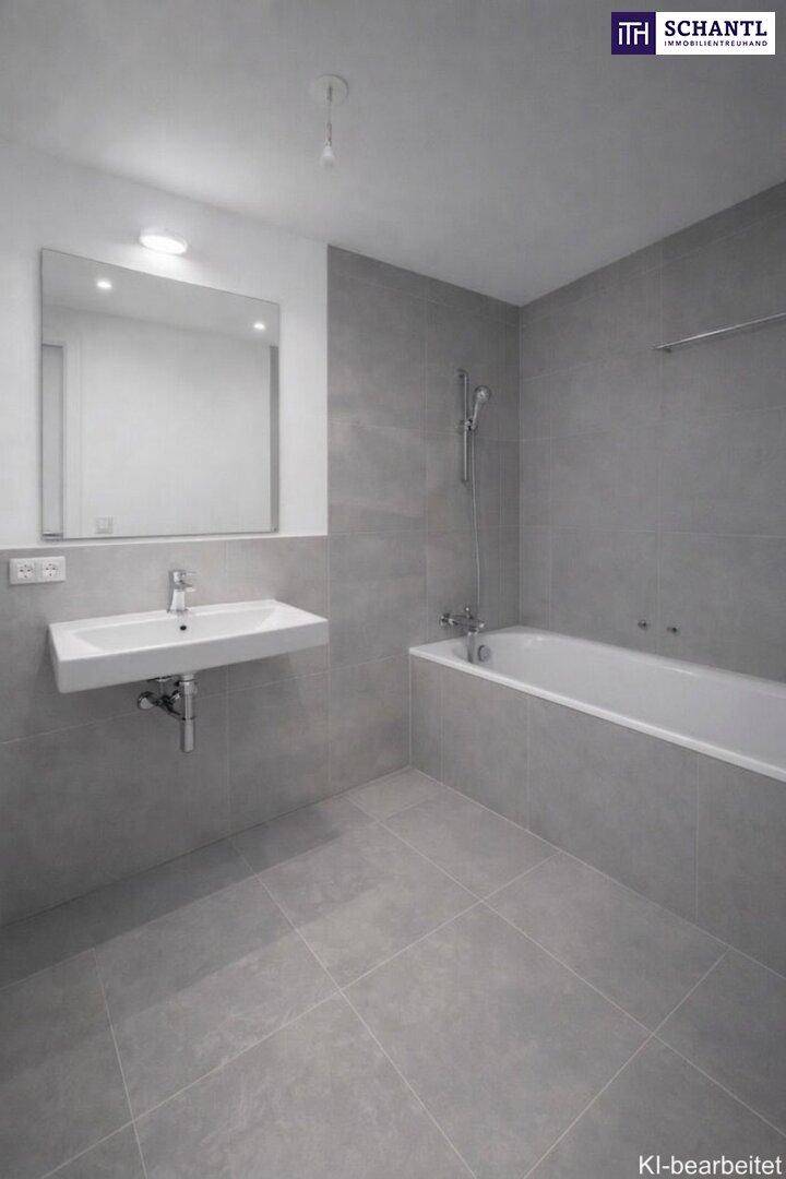 Modernes Badezimmer mit grauen Fliesen, einem Einzelwaschbecken und einer integrierten Badewanne.