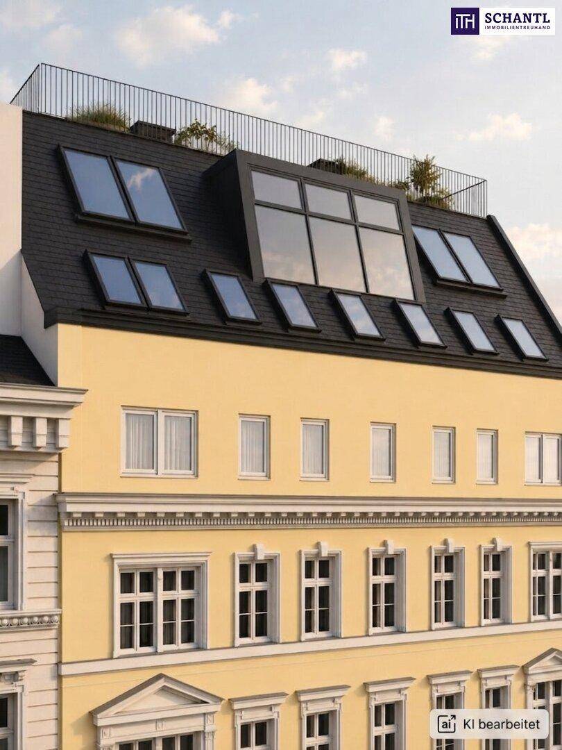 Historisches Gebäude mit modernem Dachausbau und vielen Dachfenstern.