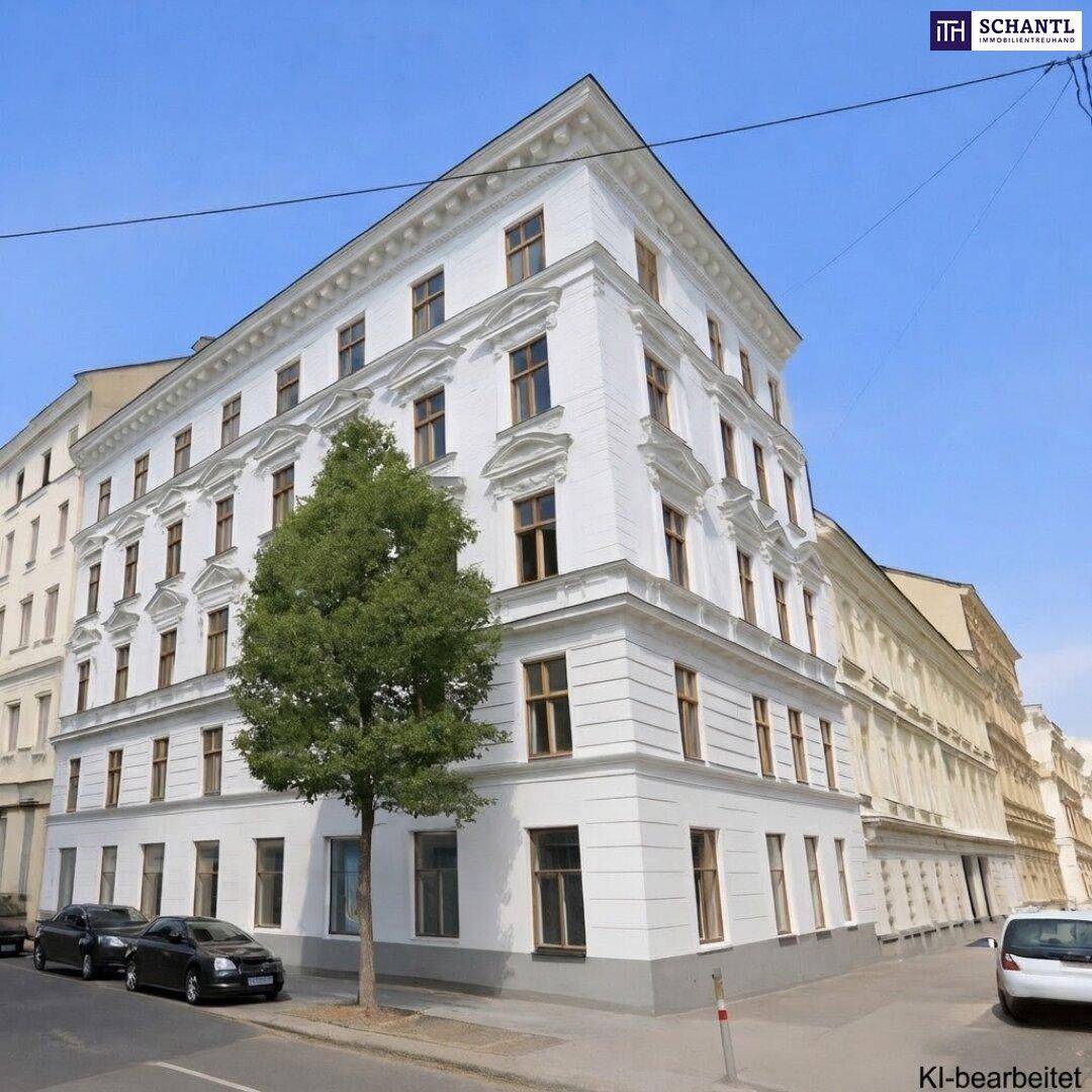 Historisches Gebäude mit weißer Fassade und klassischer Architektur an einer Stadtstraße.