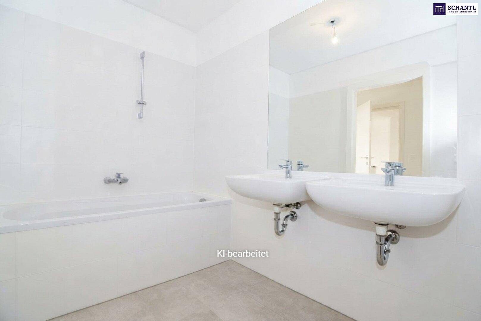 Helles, modernes Badezimmer mit Badewanne, Doppelwaschbecken und großem Spiegel.
