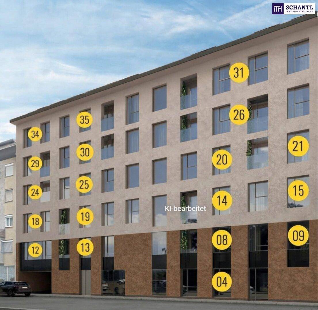 Seitenansicht der modernen Wohnanlage mit zahlreichen Fenstern und Balkonen zur Straße hin.
