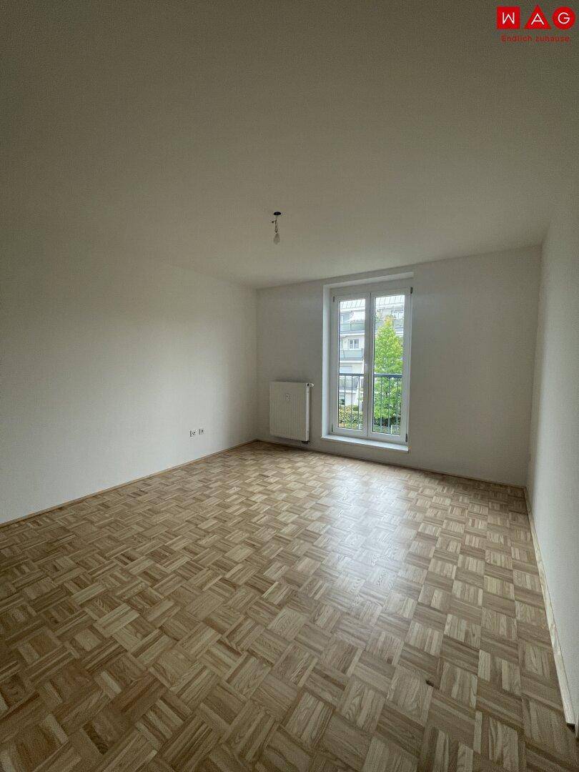 Wohnzimmer mit französischem Balkon