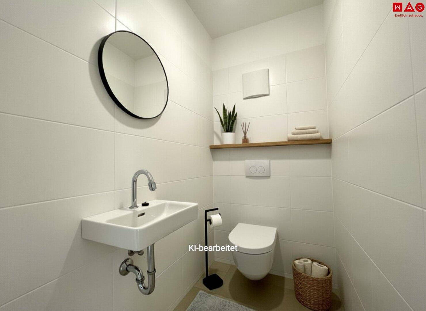 Modernes Gäste-WC mit wandhängendem WC, Waschbecken und rundem Spiegel.