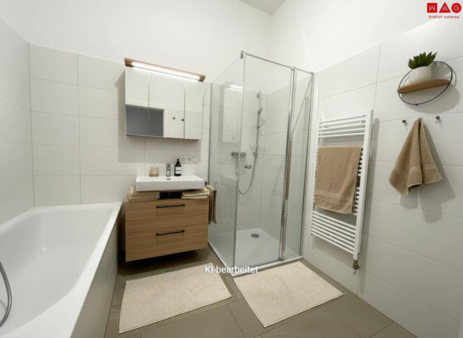Modernes Badezimmer mit Badewanne, Duschkabine und beheiztem Handtuchhalter.