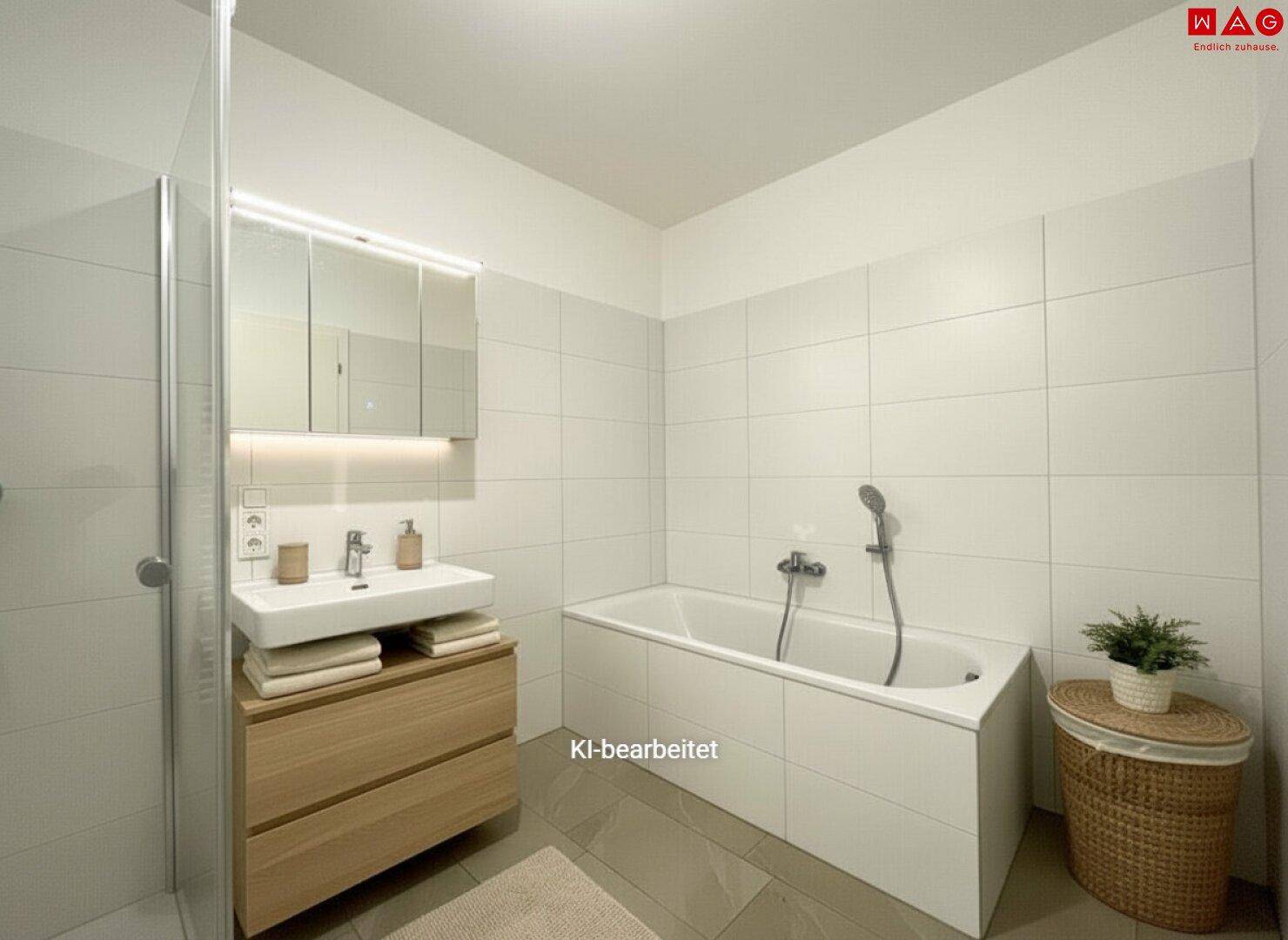 Modernes Badezimmer mit Badewanne, Duschkabine, Einzelwaschbecken und hellen Fliesen.