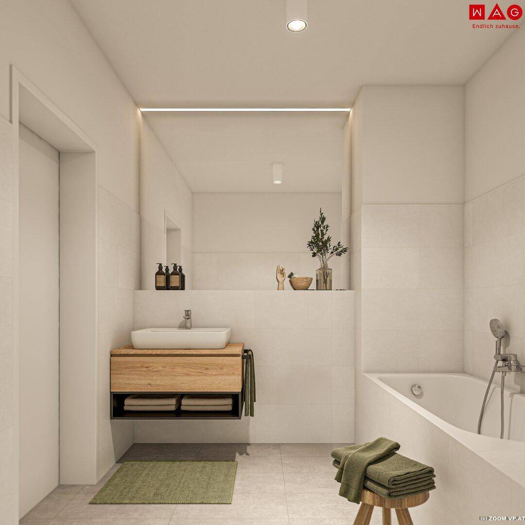 Modernes Badezimmer mit Badewanne, elegantem Holzwaschtisch und großen weißen Fliesen für ein klares Design.