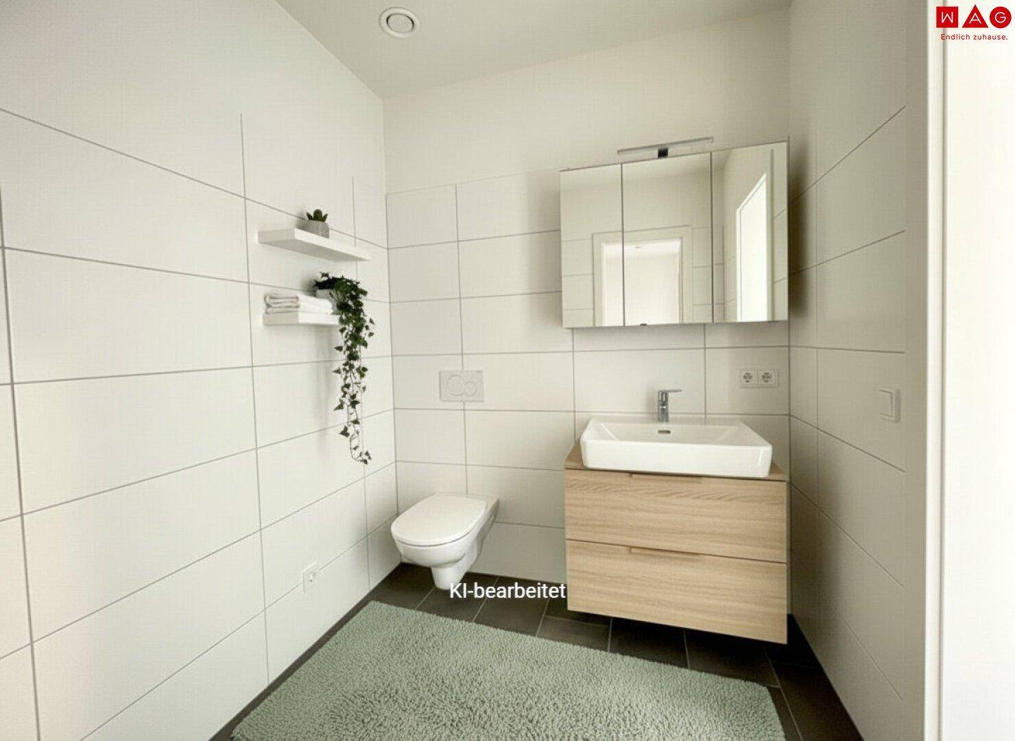 Modernes Badezimmer mit WC, Waschtisch, Spiegelschrank und weißen Fliesen, funktional und hell.