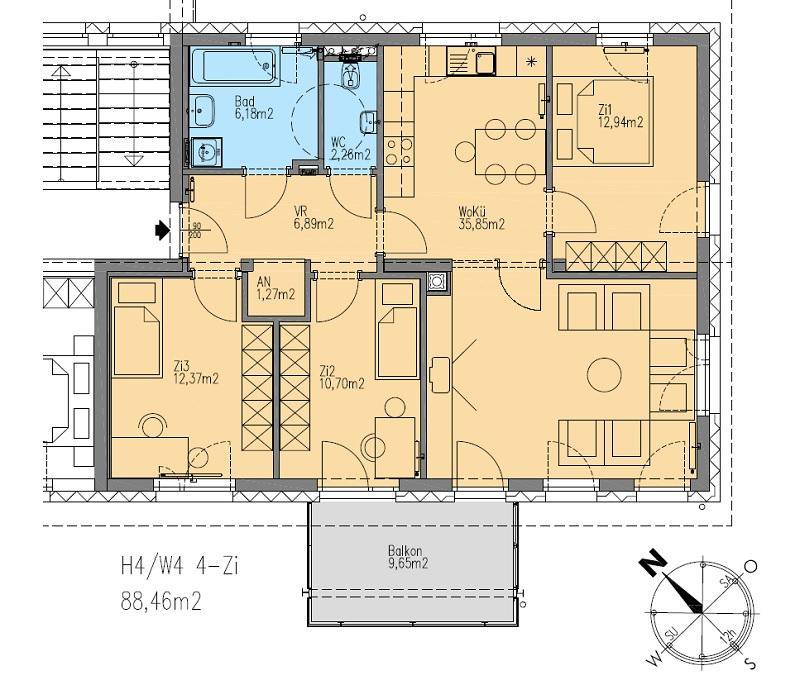 Grundriss einer 4-Zimmer-Wohnung mit offenem Wohnbereich, separatem WC und Balkon.