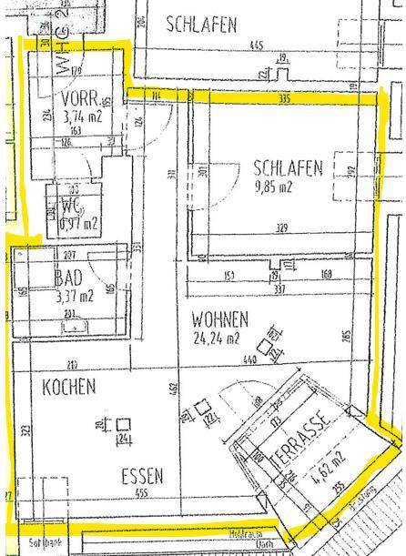 Grundriss einer Wohnung mit Schlafzimmern, Wohnbereich, Küche, Bad und Terrasse.