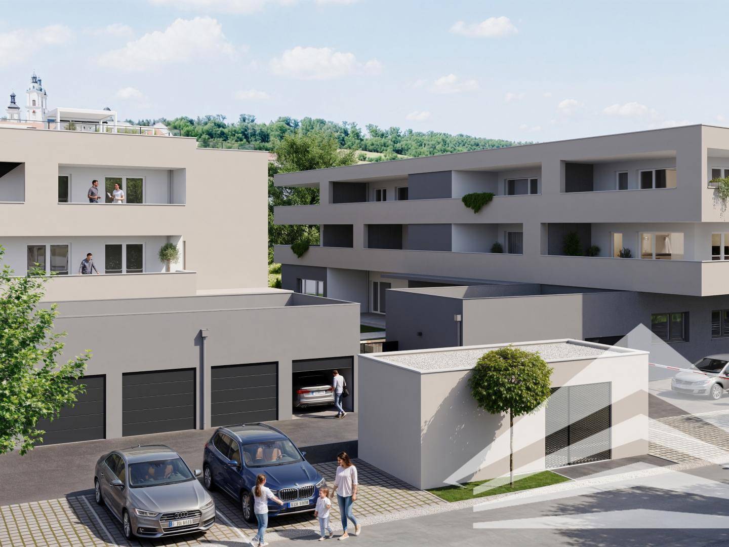 Moderne Wohnanlage mit Tiefgarage und Außenstellplätzen, umgeben von Grünflächen und Bäumen.