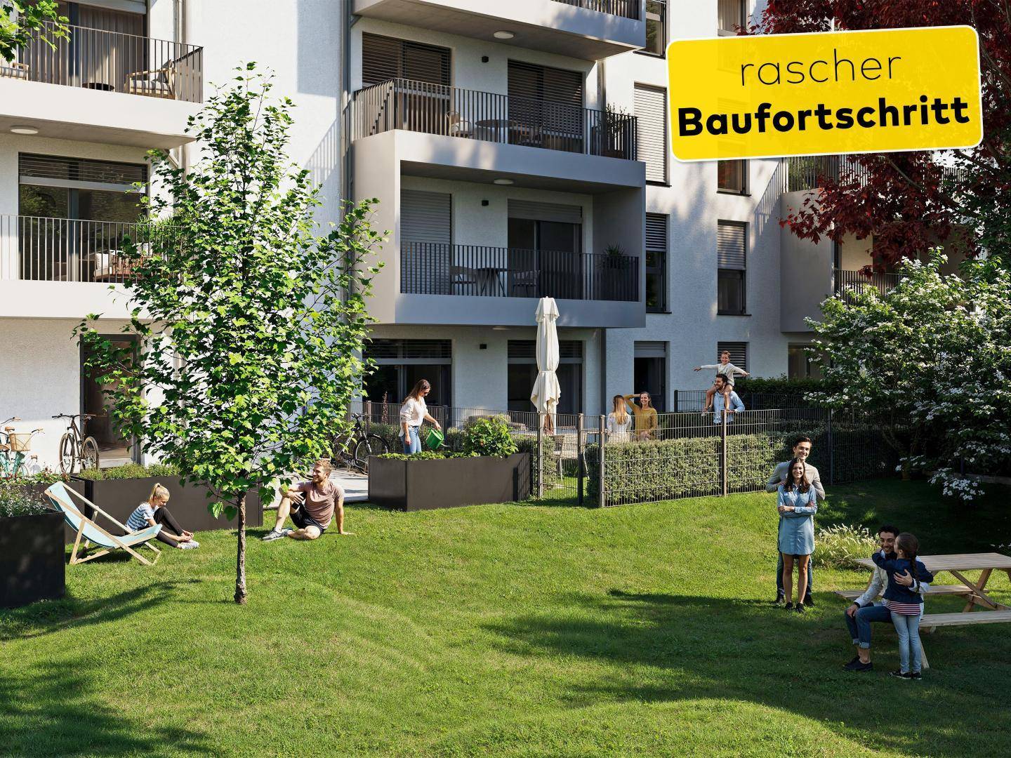 Begrünter Gemeinschaftsgarten mit Rasenfläche und Sitzgelegenheiten, ideal für Entspannung und Spiel.