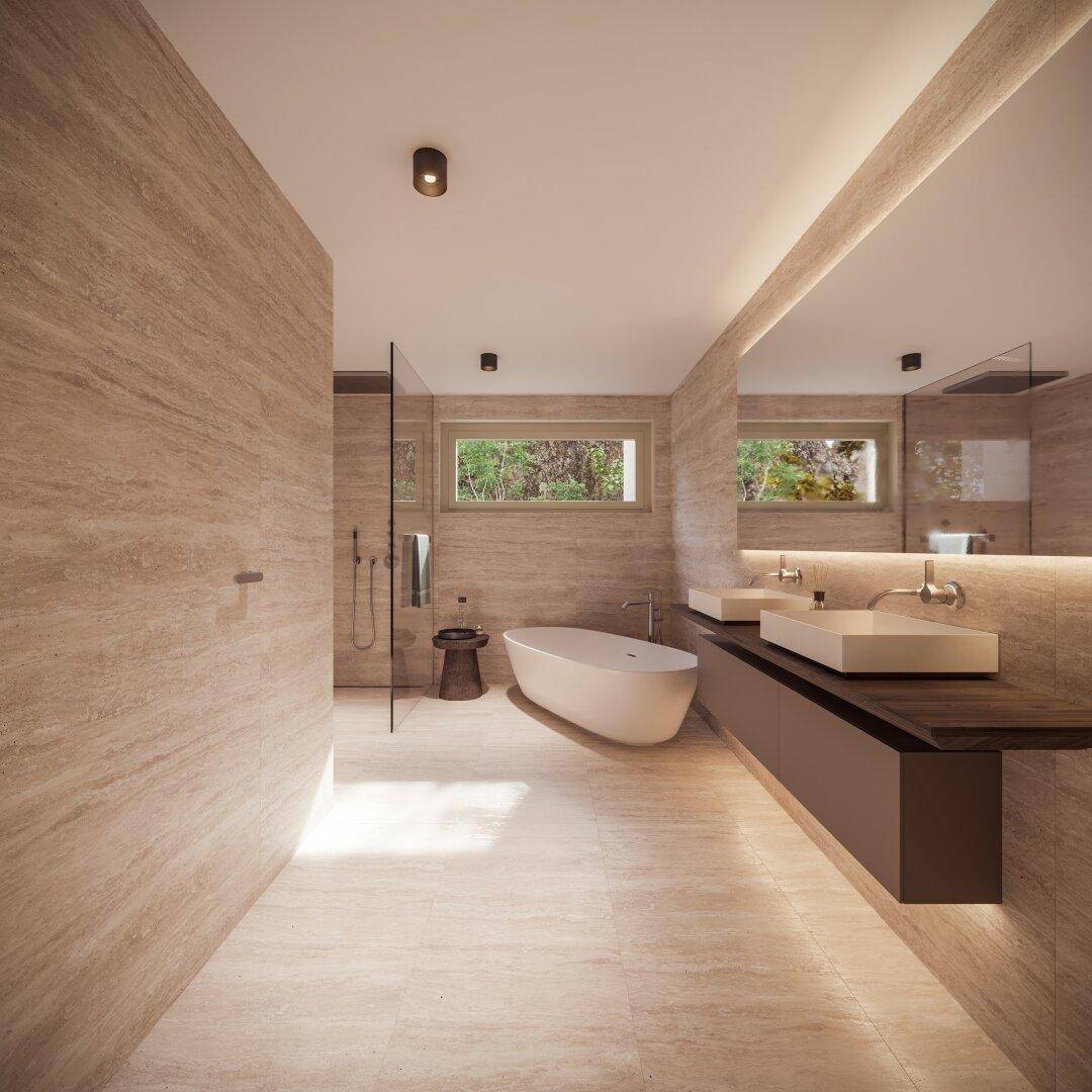 Modernes Badezimmer mit freistehender Badewanne, Doppelwaschbecken und großer Dusche.