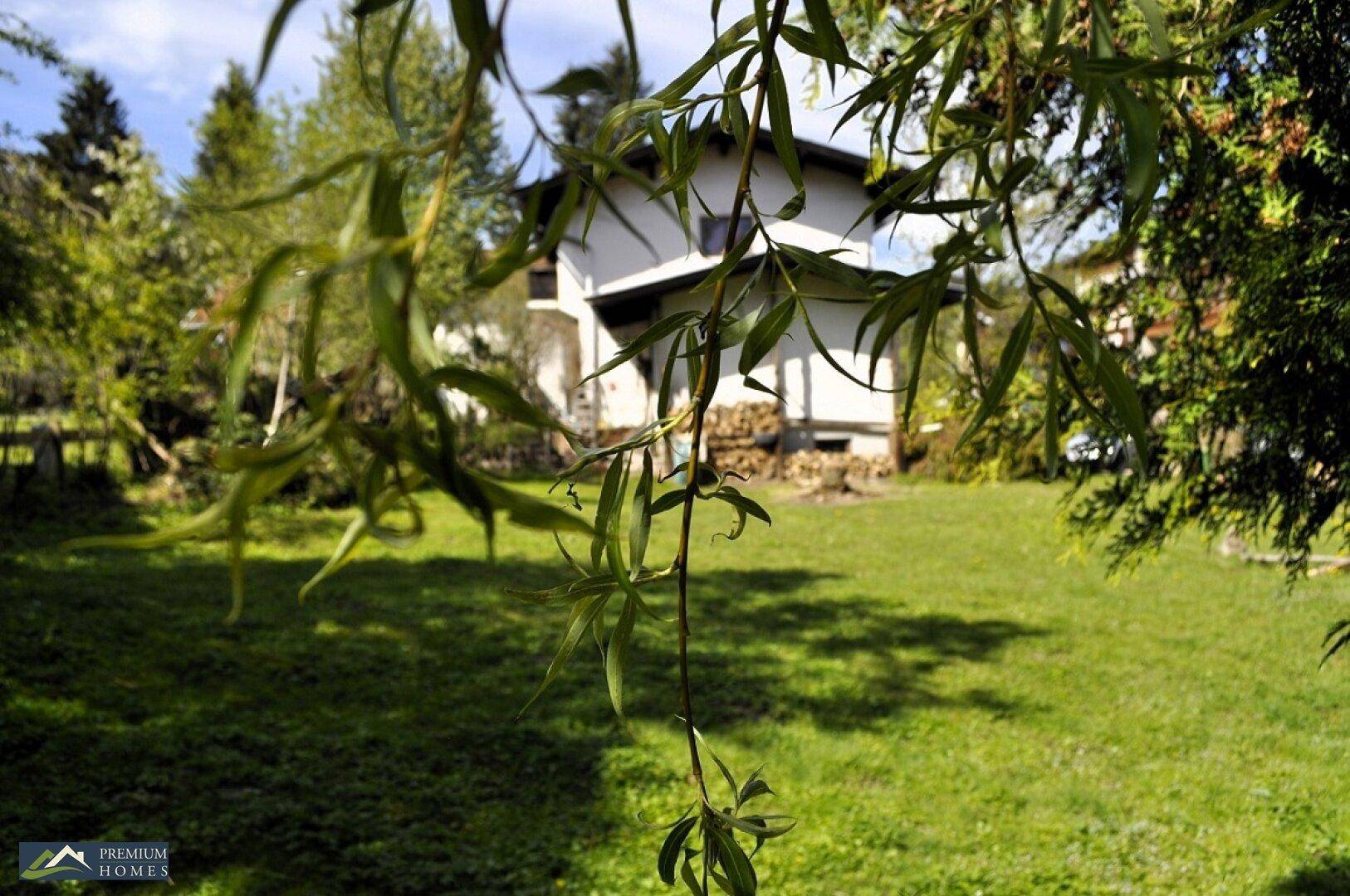 NIEDERAU - Einfamilienhaus - Sanierungsobjekt - in sonniger Lage - Gartenblick