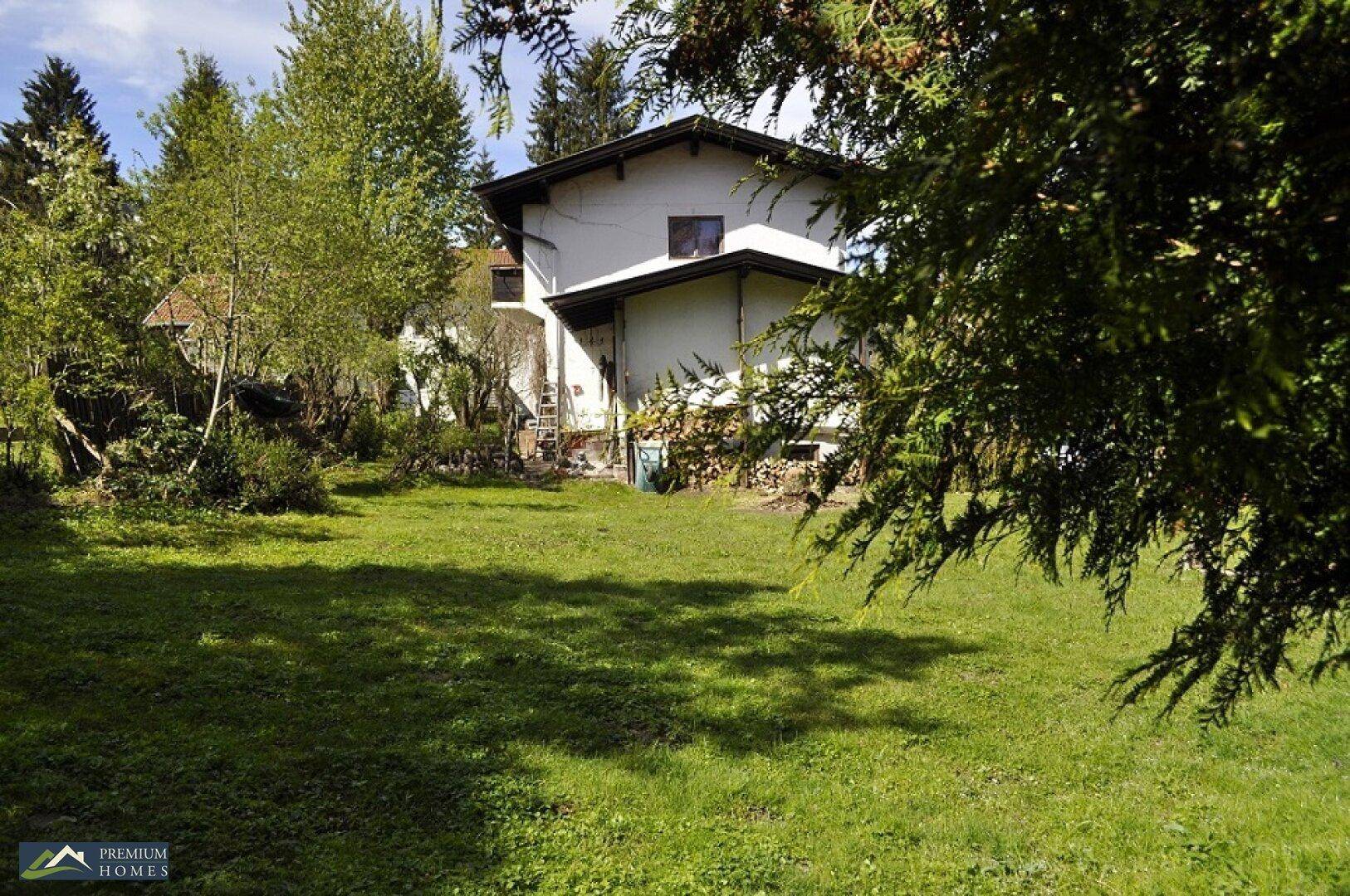 NIEDERAU - Einfamilienhaus - Sanierungsobjekt - in sonniger Lage - Gartenblick