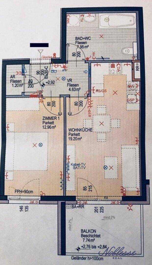 Grundriss einer Wohnung mit Wohnküche, Schlafzimmer, Bad und Balkon.