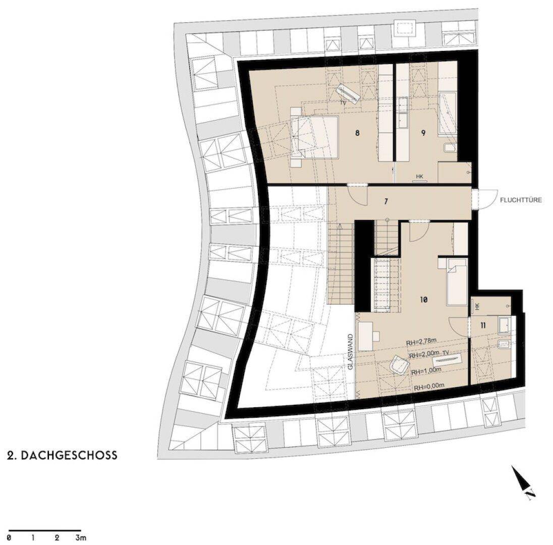 Grundriss des zweiten Dachgeschosses mit Schlafzimmern und Glaswand.