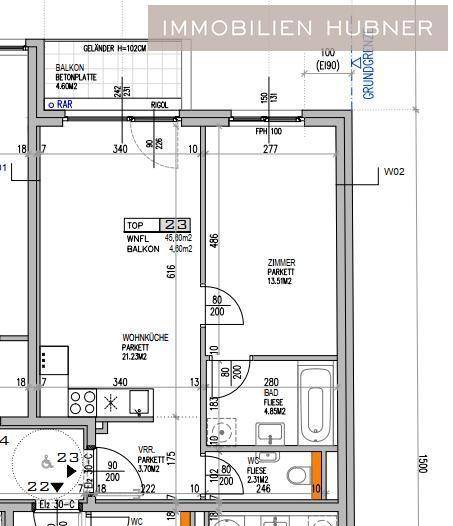 Detaillierter Grundriss einer Wohnung mit Wohnküche, Schlafzimmer und Balkon.