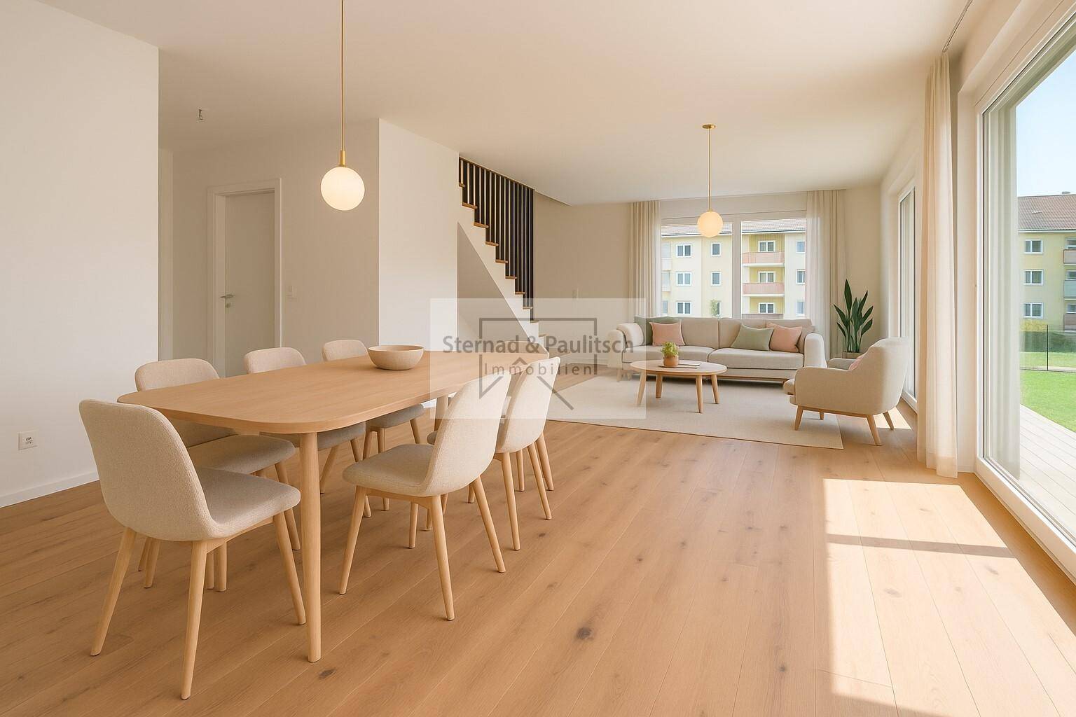 Heller, offener Wohn-Essbereich mit Holzboden, modernen Möbeln und großen Fenstern.