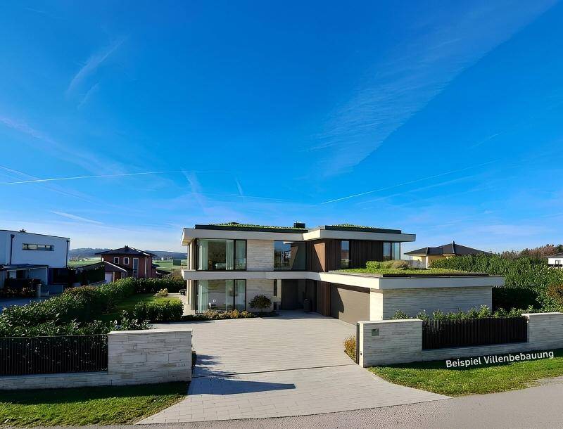 Moderne Villa mit Flachdach und großen Fensterfronten als Beispiel für eine hochwertige Bebauung.