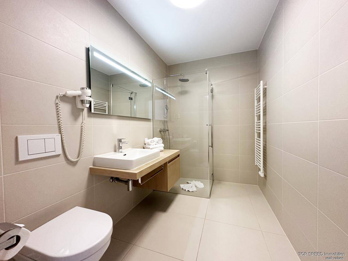 42,07m² Studio Anlage-Apartment in der Sun Lodge zur touristischen VermietungPanorama Sauna - Pool – pohled 4