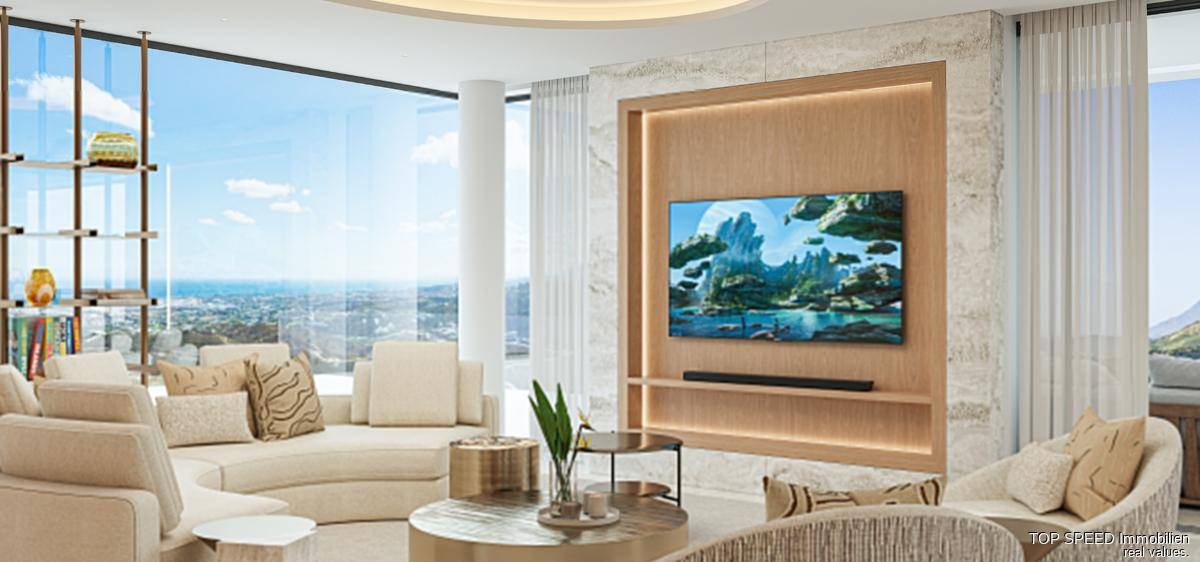Modernes Wohnzimmer mit bequemen Sofas, integriertem TV und Stadtpanorama.