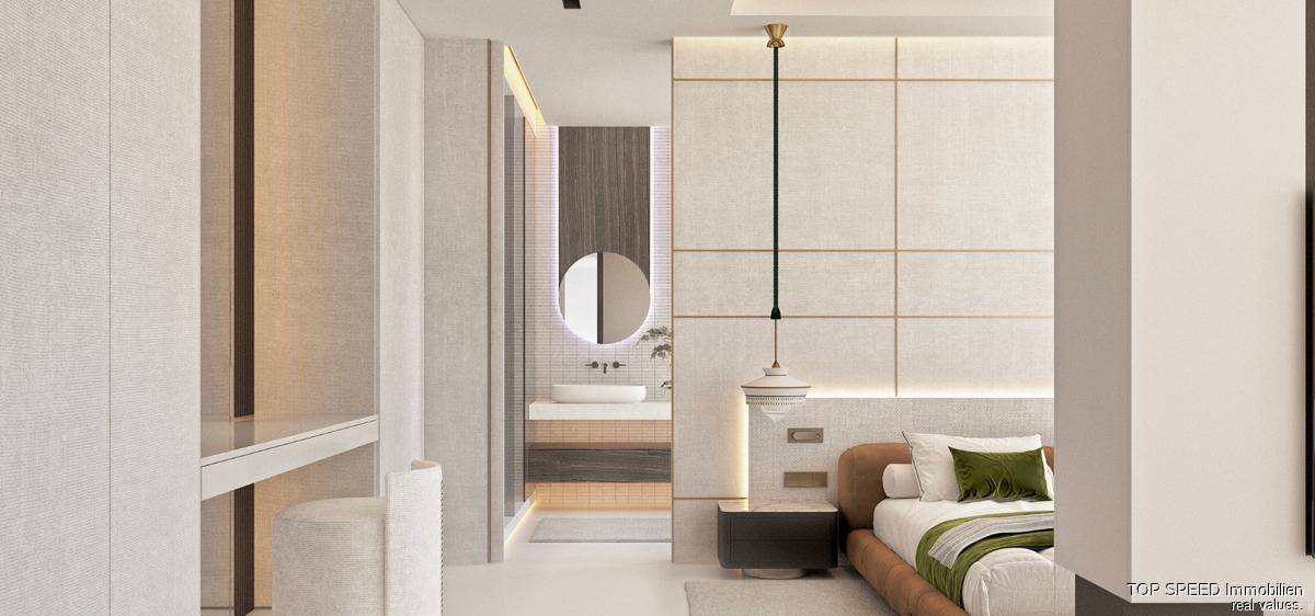 Schlafzimmer mit angrenzendem Badezimmer, modernen Möbeln und integriertem Waschtisch.
