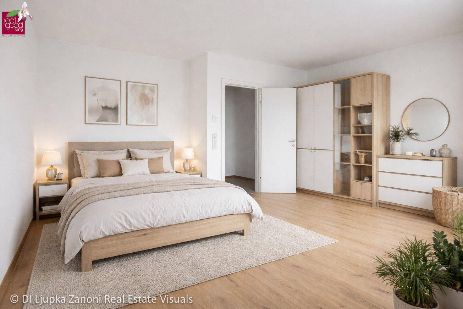 Helles Schlafzimmer mit Holzboden, Doppelbett und modernen Holzmöbeln.
