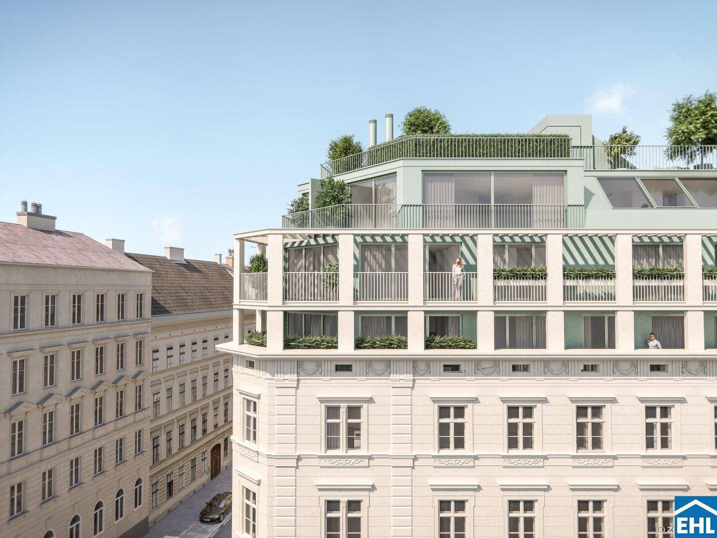 Historisches Gebäude mit moderner Dachaufstockung und begrünten Terrassen.