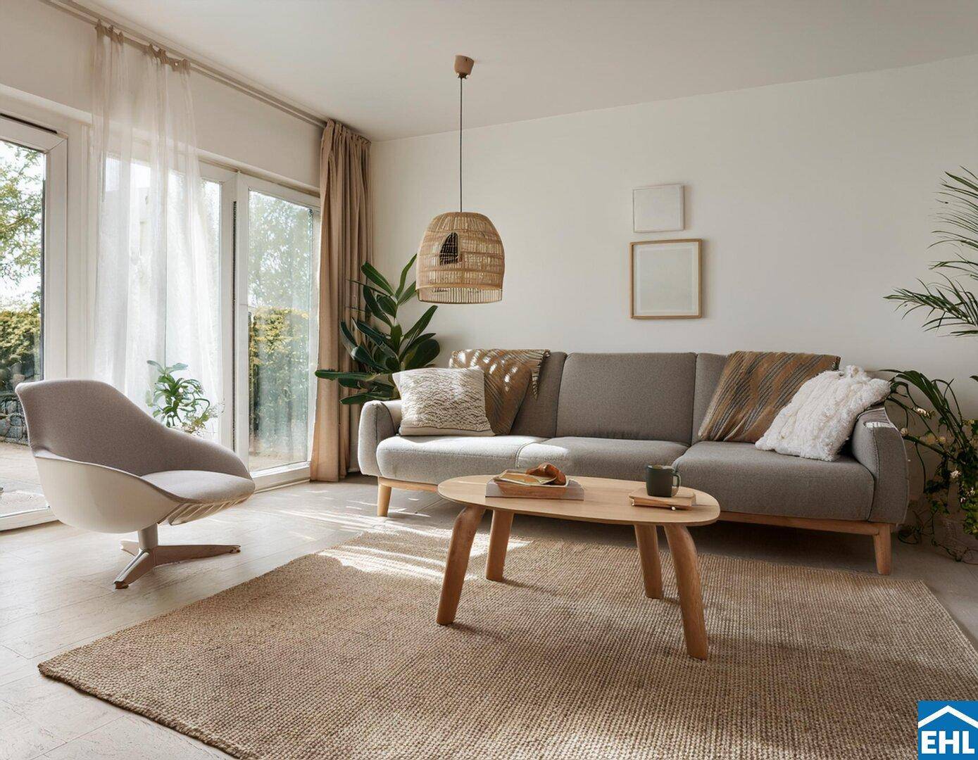 Helles Wohnzimmer mit modernem Sofa, Teppich und direktem Zugang zum Gartenbereich.