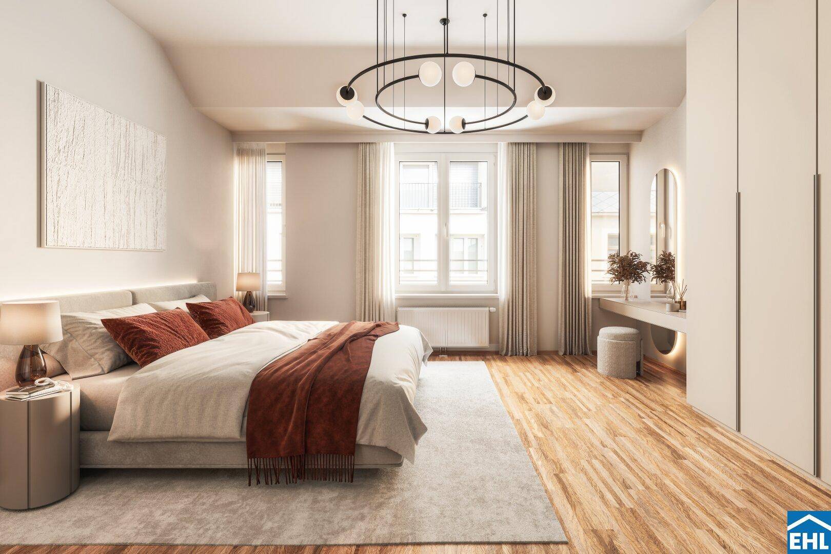 Geräumiges Schlafzimmer mit Holzboden, großem Bett, modernen Leuchten und Schminktisch.