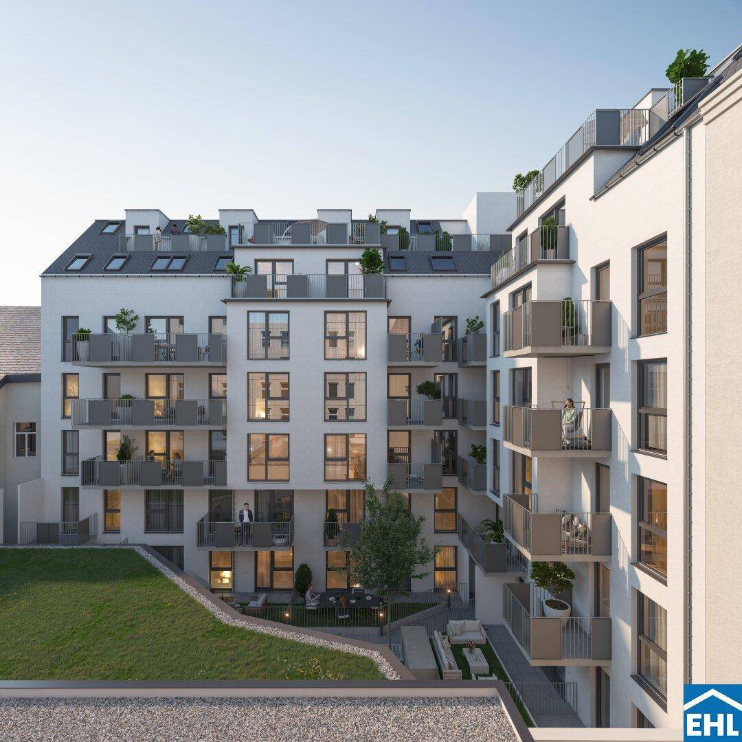 Ansicht des modernen Wohnkomplexes mit begrüntem Innenhof, Balkonen und Dachterrassen.