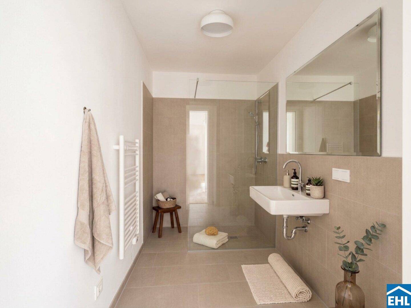 Modernes Badezimmer mit ebenerdiger Dusche, Einzelwaschbecken und Handtuchheizkörper.