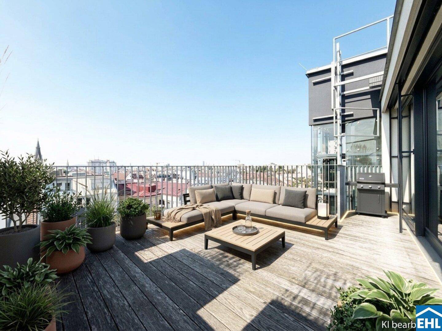 Großzügige Dachterrasse mit Holzdeck, bequemen Lounge-Möbeln und weitem Blick über die Stadt.
