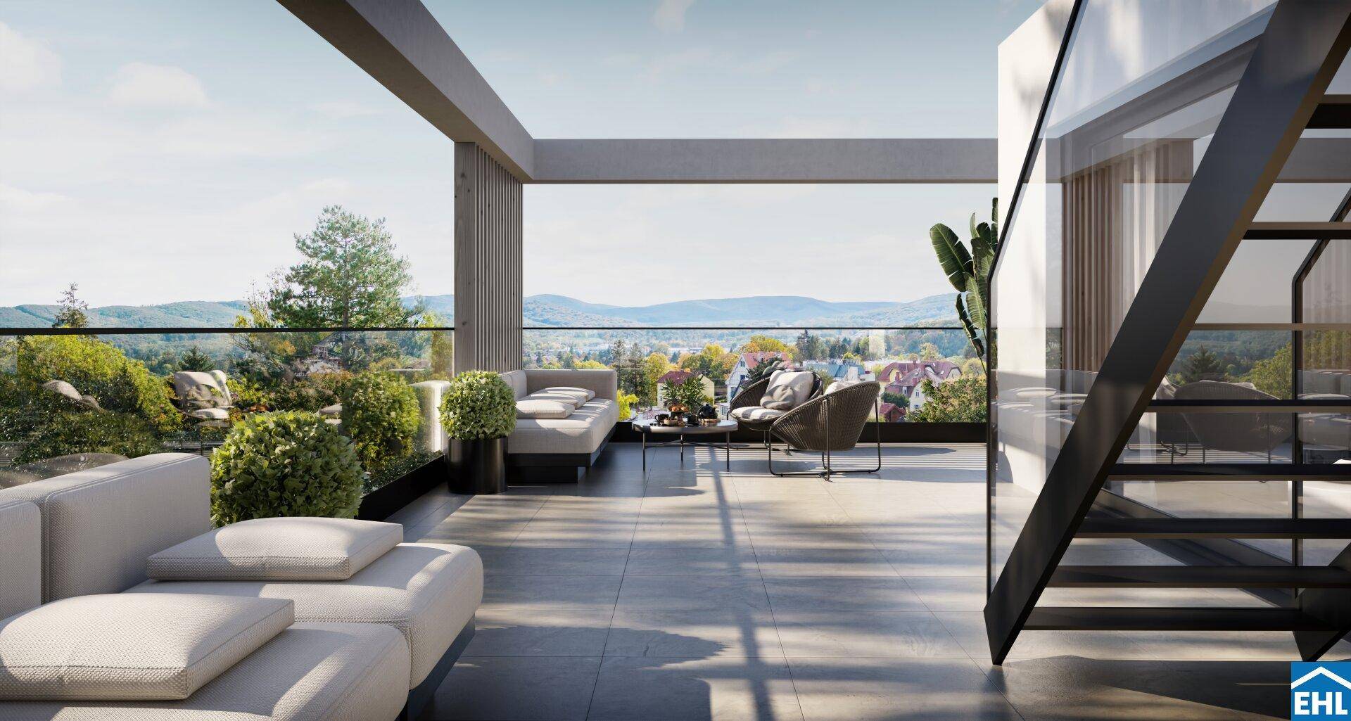 Helle Dachterrasse mit Lounge-Bereich, Glasgeländer und Panoramablick über die Landschaft.