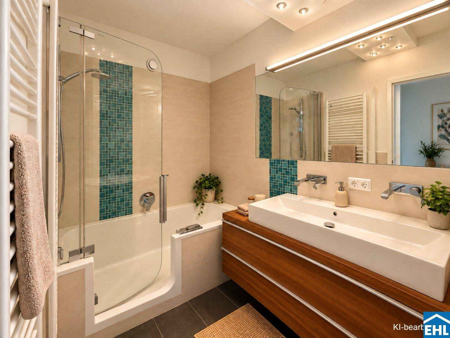 Helles Badezimmer mit Badewanne, Dusche und großem Waschtisch.