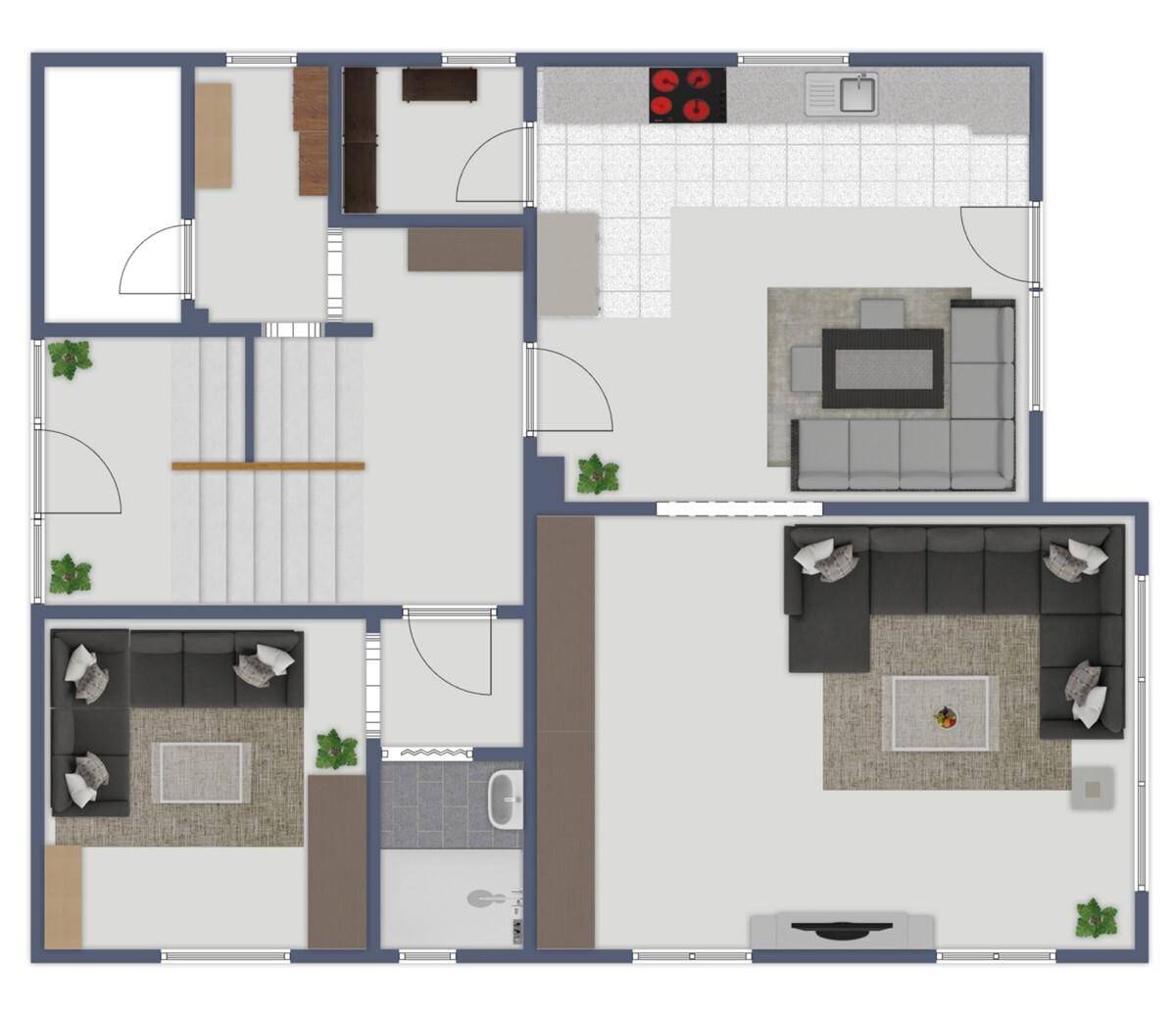 Grundriss des Erdgeschosses mit offenem Wohnbereich, Küche und einem Badezimmer.